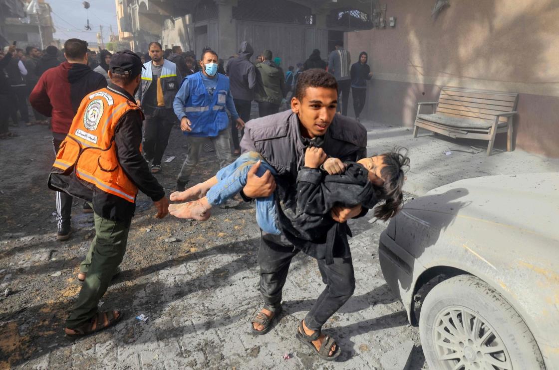 People mourn as they collect the bodies of Palestinians killed in airstrikes in Khan Yunis, Gaza, Palestine, Nov. 19, 2023. (Getty Images Photo)